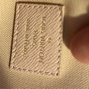 Louis Vuitton hand bag and wallet. New. Never used